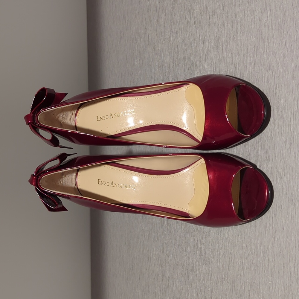 Enzo Angiolini red patent peep-toe heels with ribbon accent on the heel
